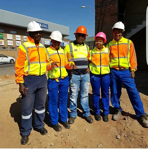 ATPGROUP HOLDINGS site inspection team in reflective workwear