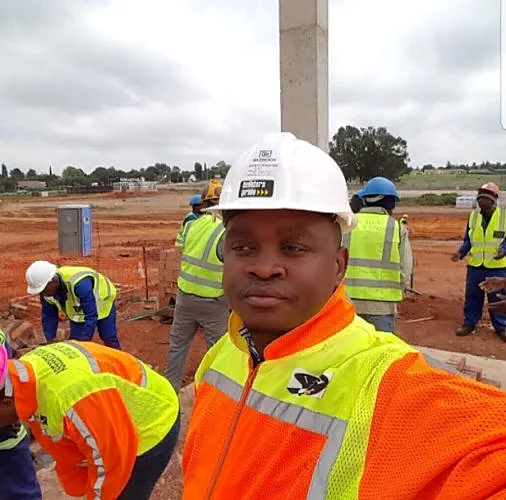 ATPGROUP HOLDINGS site manager with the team behind him